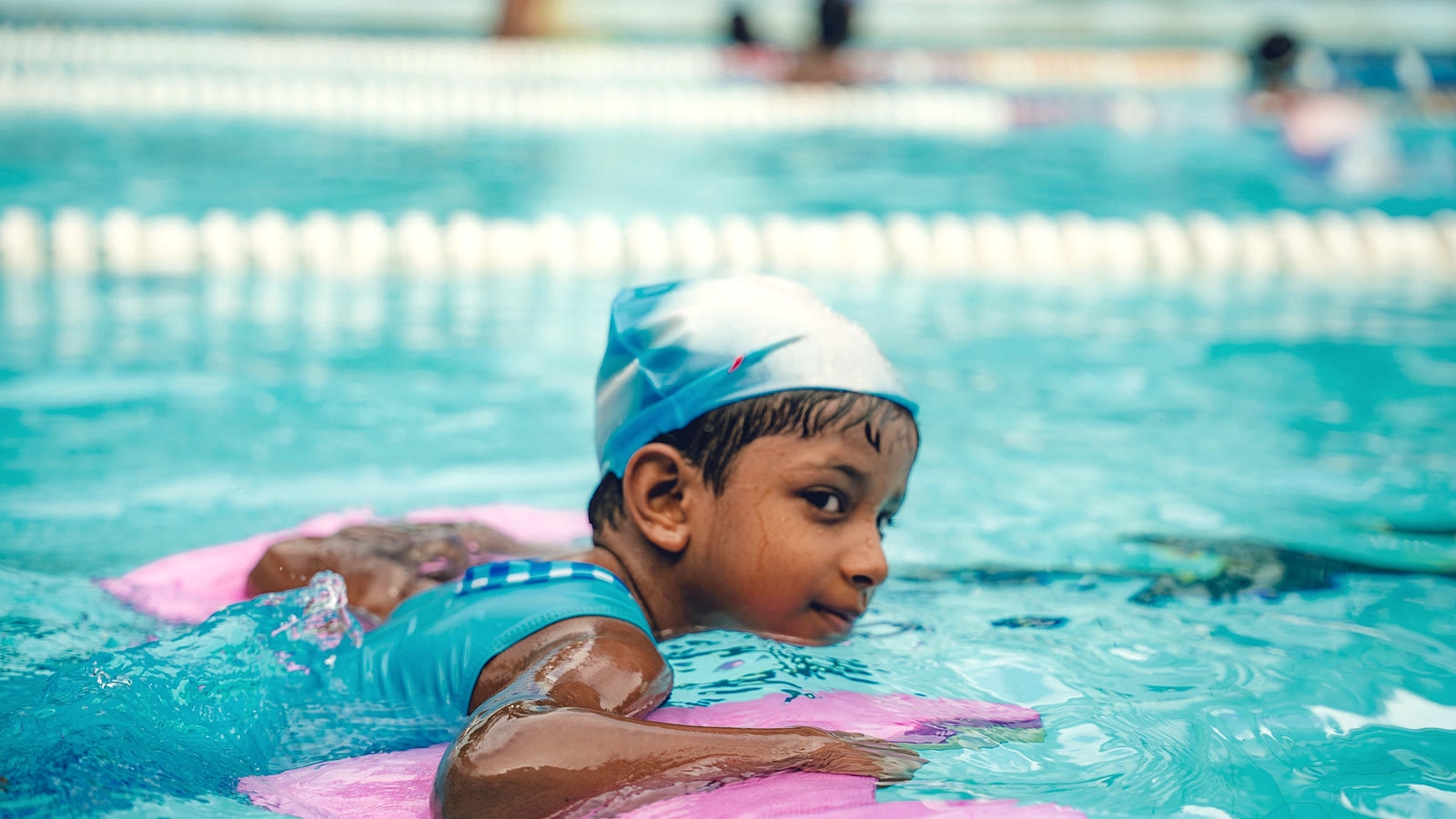 Child with kickboard